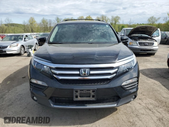 2017 Honda Pilot Elite with VIN 5FNYF6H09HB104654, listed as a Copart auction lot 55320795 with 187,306 mi miles and Clean Title. Bid and sale history available at DreamBid. Image 5.