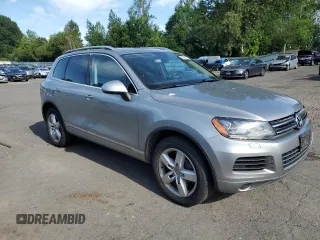 2012 Volkswagen Touareg с VIN WVGEG9BP6CD008533, выставлен на аукционе Copart как лот 60356345 с пробегом 103 270 миль миль и Чистый • Clean title. История ставок и продаж доступна на DreamBid. Изображение 4.