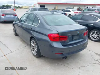 2018 BMW 3 Series 330i xDrive with VIN WBA8D9C55JEM32703, listed as a IAAI auction lot 42478412 with 79,000 mi miles and . Bid and sale history available at DreamBid. Image 3.