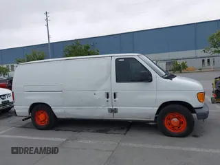2006 Ford Econoline Cargo with VIN 1FTRE14W16HA85762, listed as a IAAI auction lot 42075835 with 88,491 mi miles. Bid and sale history available at carsss.com. Image 12.
