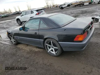 1994 Mercedes-Benz SL 5.0L with VIN WDBFA67E3RF102932, listed as a Copart auction lot 79107264 with 149,344 mi miles and Salvage title. Bid and sale history available at DreamBid. Image 2.