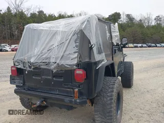 2003 Jeep Wrangler X with VIN 1J4FA39S33P375741, listed as a IAAI auction lot 40858427 with Not provided miles and . Bid and sale history available at DreamBid. Image 4.