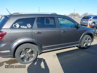 2016 Dodge Journey Crossroad Plus z VIN 3C4PDDGGXGT135934, wystawiony jako IAAI lot #41976026 z przebiegiem 141 181 mil mil oraz . Historia ofert i sprzedaży dostępna na DreamBid. Obrazek 13.