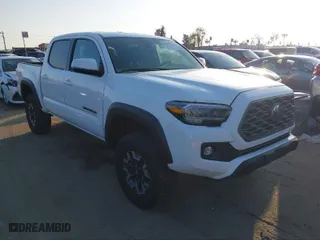 2023 Toyota Tacoma 4WD SR with VIN 3TMCZ5AN4PM541165, listed as a IAAI auction lot 41651949 with 43,074 mi miles. Bid and sale history available at carsss.com. Image 1.