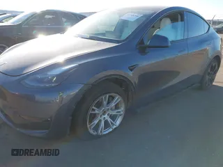 2023 Tesla Model Y Long Range with VIN 7SAYGAEEXPF714760, listed as a IAAI auction lot 41748398 with 49,802 mi miles and . Bid and sale history available at DreamBid. Image 6.