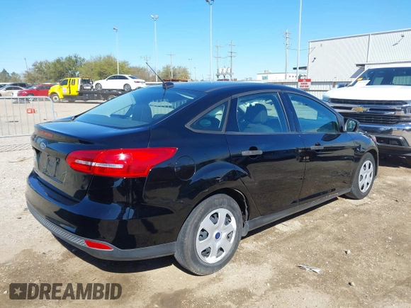 2018 Ford Focus S with VIN 1FADP3E29JL259004, listed as a IAAI auction lot 41841485 with 77,567 mi miles. Bid and sale history available at carsss.com. Image 4.
