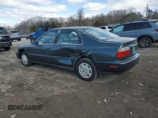 1996 Honda Accord Value with VIN 1HGCD5699TA207734, listed as a Copart auction lot 45049365 with 269,491 mi miles and Salvage Title. Bid and sale history available at DreamBid. Image 2.