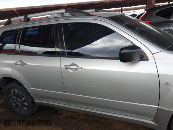 2003 Mitsubishi Outlander LS with VIN JA4LX31G33U120467, listed as a IAAI auction lot 41576333 with 185,576 mi miles. Bid and sale history available at carsss.com. Image 13.