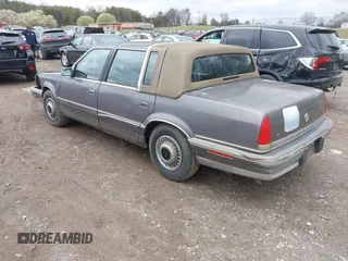 1992 Chrysler New Yorker z VIN 1C3XV66L3ND861794, wystawiony jako IAAI lot #41844564 z przebiegiem 68 016 mil mil oraz . Historia ofert i sprzedaży dostępna na DreamBid. Obrazek 3.