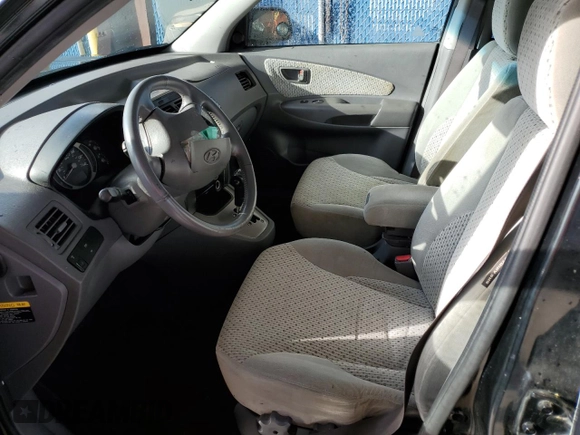 2005 Hyundai Tucson GLS with VIN KM8JN12D85U062222, listed as a Copart auction lot 77317334 with 192,758 mi miles and Salvage Title. Bid and sale history available at carsss.com. Image 7.