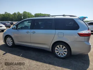 2015 Toyota Sienna Limited with VIN 5TDDK3DC4FS111836, listed as a Copart auction lot 61940595 with 111,579 mi miles and Salvage title. Bid and sale history available at DreamBid. Image 2.