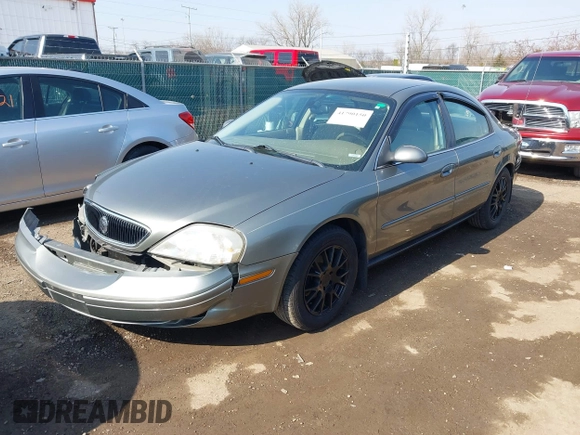 2003 Mercury Sable GS z VIN 1MEFM50243A619761, wystawiony jako IAAI lot #41790150 z przebiegiem 114 522 mil mil oraz . Historia ofert i sprzedaży dostępna na DreamBid. Obrazek 2.