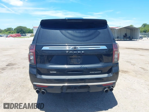 2021 Chevrolet Tahoe Premier with VIN 1GNSKSKDXMR195984, listed as a IAAI auction lot 42528305 with 89,925 mi miles and . Bid and sale history available at DreamBid. Image 17.