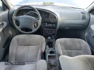 2003 Kia Spectra z VIN KNAFB121435232105, wystawiony jako Copart lot #88780695 z przebiegiem 161 466 mil mil oraz Szkoda całkowita • Salvage title. Historia ofert i sprzedaży dostępna na DreamBid. Obrazek 8.