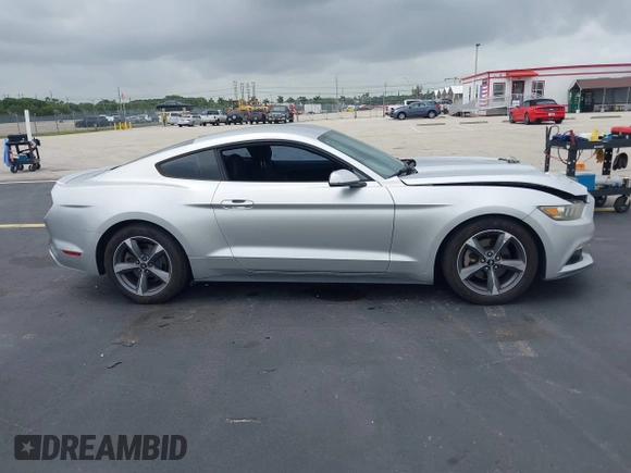 2015 Ford Mustang V6 z VIN 1FA6P8AM1F5316868, wystawiony jako IAAI lot #42618687 z przebiegiem 93 238 mil mil oraz . Historia ofert i sprzedaży dostępna na DreamBid. Obrazek 14.