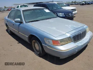2000 Mercury Grand Marquis LS z VIN 2MEFM75W8YX660478, wystawiony jako IAAI lot #42289748 z przebiegiem 237 860 mil mil oraz . Historia ofert i sprzedaży dostępna na DreamBid. Obrazek 1.