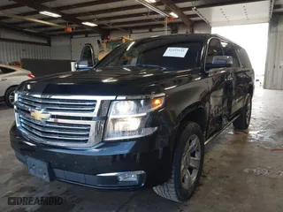 2015 Chevrolet Suburban LTZ with VIN 1GNSKKKC2FR115572, listed as a IAAI auction lot 41959541 with 120,123 mi miles. Bid and sale history available at carsss.com. Image 17.