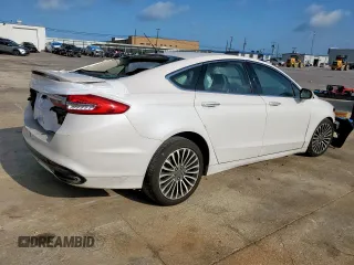 2018 Ford Fusion Titanium с VIN 3FA6P0K94JR275623, выставлен на аукционе Copart как лот 59639215 с пробегом 84 919 миль миль и Списание • Salvage title. История ставок и продаж доступна на DreamBid. Изображение 3.