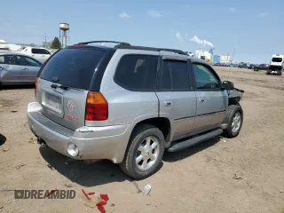 2006 GMC Envoy SLE z VIN 1GKDT13S662171123, wystawiony jako Copart lot #56418255 z przebiegiem 106 777 mil mil oraz Szkoda całkowita • Salvage title. Historia ofert i sprzedaży dostępna na DreamBid. Obrazek 3.