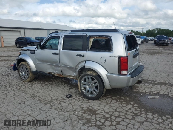 2010 Dodge Nitro Heat with VIN 1D4PU4GK2AW170976, listed as a Copart auction lot 57406765 with 213,121 mi miles and Salvage title. Bid and sale history available at DreamBid. Image 2.