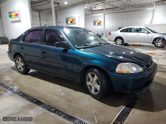 1997 Honda Civic LX with VIN 1HGEJ6572VL027980, listed as a Copart auction lot 53024335 with 269,396 mi miles and Salvage Title. Bid and sale history available at carsss.com. Image 4.