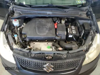 2010 Suzuki SX4 z VIN JS2YB5A36A6300326, wystawiony jako Copart lot #84372804 z przebiegiem 51 036 mil mil oraz Tytuł czysty. Historia ofert i sprzedaży dostępna na DreamBid. Obrazek 11.