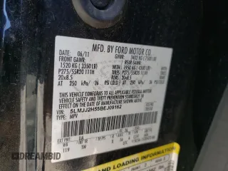 2011 Lincoln Navigator z VIN 5LMJJ2H55BEJ09162, wystawiony jako Copart lot #74710464 z przebiegiem 240 501 mil mil oraz Szkoda całkowita • Salvage title. Historia ofert i sprzedaży dostępna na DreamBid. Obrazek 14.