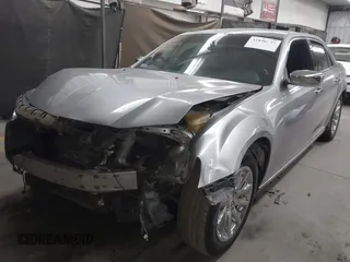2013 Chrysler 300 with VIN 2C3CCAEG4DH691524, listed as a IAAI auction lot 41890003 with 92,228 mi miles. Bid and sale history available at carsss.com. Image 2.