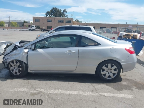 2010 Honda Civic Cpe LX with VIN 2HGFG1B64AH519662, listed as a IAAI auction lot 42006635 with 84,119 mi miles. Bid and sale history available at carsss.com. Image 14.