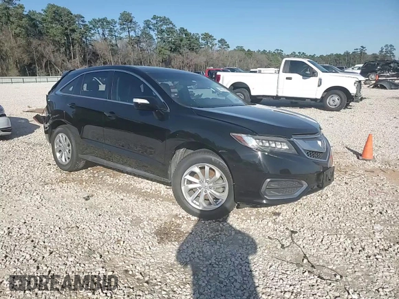 2018 Acura RDX Technology with VIN 5J8TB3H57JL005027, listed as a Copart auction lot 46951465 with 128,041 mi miles and Salvage Title. Bid and sale history available at DreamBid. Image 14.