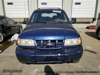 1999 Kia Sportage with VIN KNDJB7231X5614082, listed as a Copart auction lot 75604744 with 130,977 mi miles and Salvage Title. Bid and sale history available at carsss.com. Image 5.