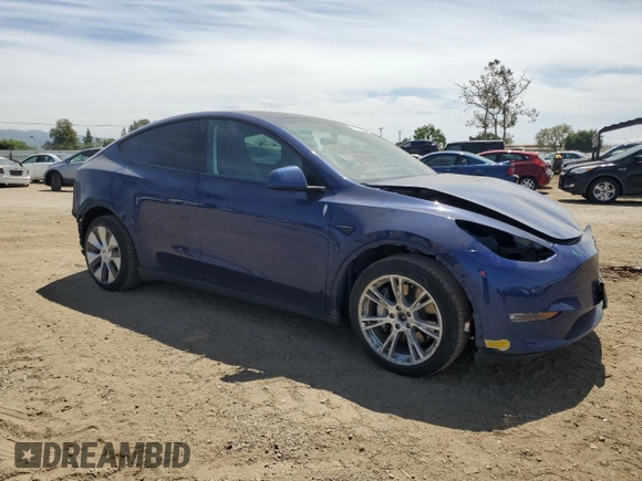 2021 Tesla Model Y Long Range with VIN 5YJYGDEE7MF114420, listed as a Copart auction lot 53889365 with 74,363 mi miles and Salvage Title. Bid and sale history available at DreamBid. Image 4.