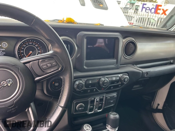 2021 Jeep Gladiator 80th Anniversary with VIN 1C6HJTAG0ML541509, listed as a Copart auction lot 50540975 with 50,754 mi miles and Clean title. Bid and sale history available at DreamBid. Image 9.
