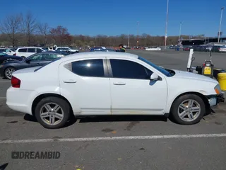 2012 Dodge Avenger SXT with VIN 1C3CDZCB7CN196369, listed as a IAAI auction lot 41932665 with 136,568 mi miles and . Bid and sale history available at carsss.com. Image 13.