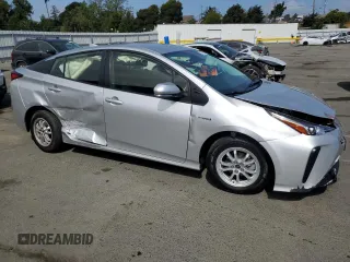 2021 Toyota Prius L Eco with VIN JTDKAMFUXM3130587, listed as a Copart auction lot 53167245 with 11,560 mi miles and Salvage title. Bid and sale history available at DreamBid. Image 4.