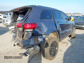 2021 Jeep Grand Cherokee 80th Anniversary with VIN 1C4RJFBG5MC827059, listed as a IAAI auction lot 40958909 with 38,000 mi miles and . Bid and sale history available at DreamBid. Image 4.