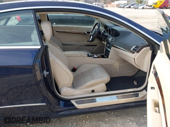 2015 Mercedes-Benz E-Class E 400 with VIN WDDKJ6FB4FF307393, listed as a IAAI auction lot 41775634 with 100,928 mi miles. Bid and sale history available at carsss.com. Image 5.