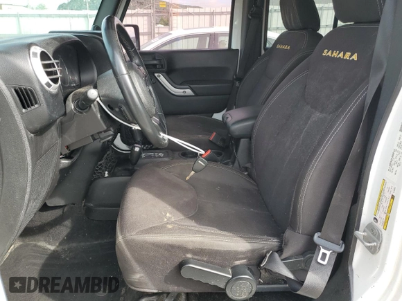 2014 Jeep Wrangler Unlimited Sahara z VIN 1C4BJWEG9EL102336, wystawiony jako Copart lot #55391335 z przebiegiem Nie podano mil oraz Szkoda całkowita • Salvage title. Historia ofert i sprzedaży dostępna na DreamBid. Obrazek 7.