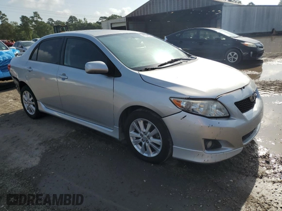2010 Toyota Corolla with VIN 1NXBU4EE7AZ227815, listed as a Copart auction lot 61234235 with 167,828 mi miles and Salvage title. Bid and sale history available at DreamBid. Image 4.