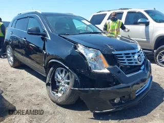 2014 Cadillac SRX Premium Collection with VIN 3GYFNGE36ES519023, listed as a IAAI auction lot 41982048 with 115,257 mi miles and . Bid and sale history available at DreamBid. Image 1.