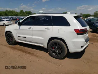 2018 Jeep Grand Cherokee with VIN NJ1449E, listed as a Copart auction lot 51357834 with 32,619 mi miles and Salvage title. Bid and sale history available at DreamBid. Image 2.
