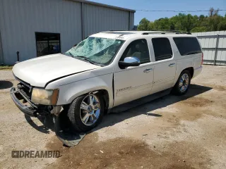 2010 Chevrolet Suburban LTZ with VIN 1GNUCKE03AR274164, listed as a Copart auction lot 52984885 with 238,689 mi miles and Salvage title. Bid and sale history available at DreamBid. Image 1.