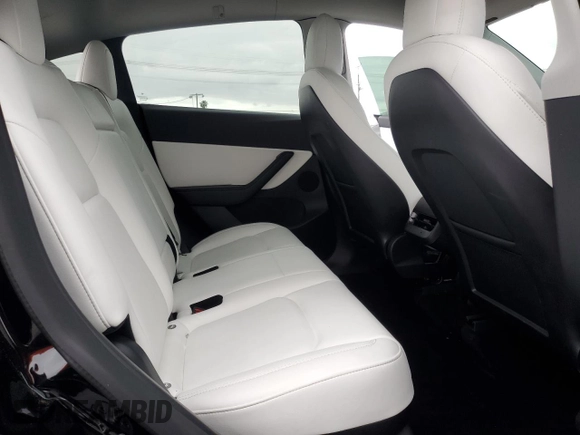 2022 Tesla Model Y Performance with VIN 7SAYGDEF7NF318647, listed as a Copart auction lot 53822465 with 38,724 mi miles and Salvage title. Bid and sale history available at DreamBid. Image 12.
