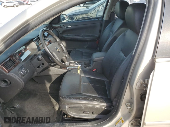 2012 Chevrolet Impala LTZ with VIN 2G1WC5E37C1195954, listed as a Copart auction lot 48585085 with 110,940 mi miles and Salvage Title. Bid and sale history available at DreamBid. Image 7.