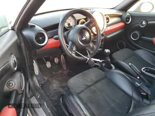 2013 MINI Coupe S z VIN WMWSX3C57DT408719, wystawiony jako Copart lot #75440574 z przebiegiem Nie podano mil oraz Szkody całkowita. Historia ofert i sprzedaży dostępna na DreamBid. Obrazek 8.