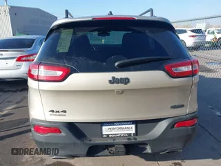 2015 Jeep Cherokee Latitude with VIN 1C4PJMCS4FW578401, listed as a IAAI auction lot 41014082 with 127,465 mi miles. Bid and sale history available at carsss.com. Image 16.