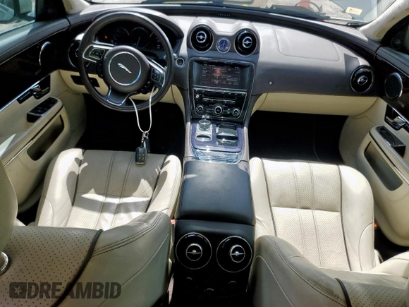 2013 Jaguar XJ Portfolio with VIN SAJWJ2GD5D8V49505, listed as a Copart auction lot 61171955 with 129,158 mi miles and Salvage title. Bid and sale history available at DreamBid. Image 8.
