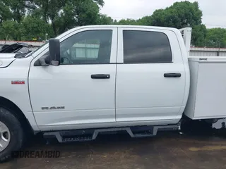 2022 Ram 2500 Tradesman z VIN 3C7WR4HJ1NG424247, wystawiony jako IAAI lot #41943490 z przebiegiem 56 423 mil mil oraz . Historia ofert i sprzedaży dostępna na DreamBid. Obrazek 14.