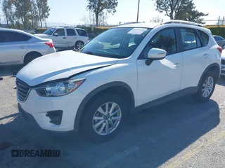 2016 Mazda CX-5 Sport with VIN JM3KE2BY9G0879654, listed as a IAAI auction lot 41819154 with 65,586 mi miles. Bid and sale history available at carsss.com. Image 18.