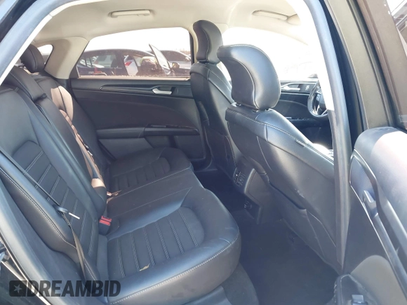 2018 Ford Fusion SE z VIN 3FA6P0H77JR180057, wystawiony jako IAAI lot #41729451 z przebiegiem 122 200 mil mil oraz . Historia ofert i sprzedaży dostępna na DreamBid. Obrazek 8.